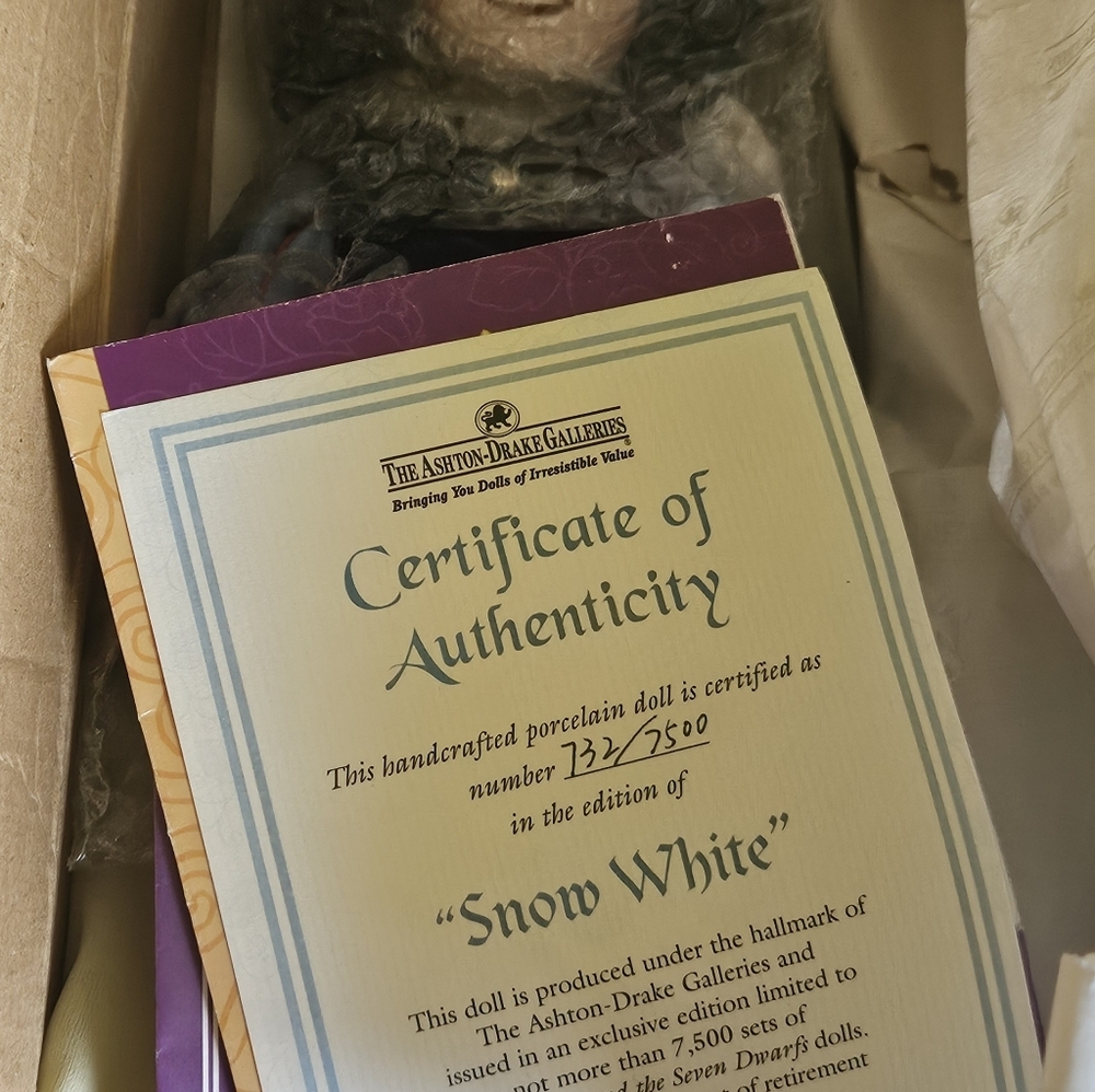 Snow white porcelain doll, and dwarfs ,4 brand new in boxes Vintage